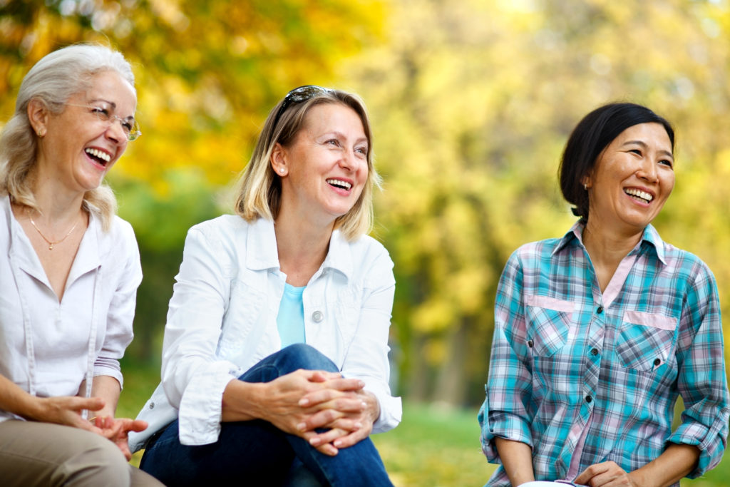 3 smiling women
