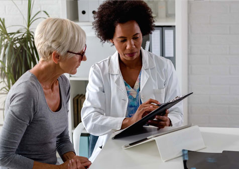 clinician with clipboard